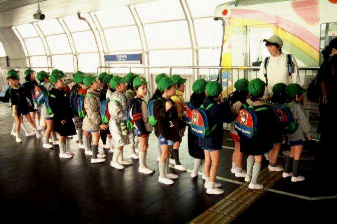 Japanese school children subway field trip